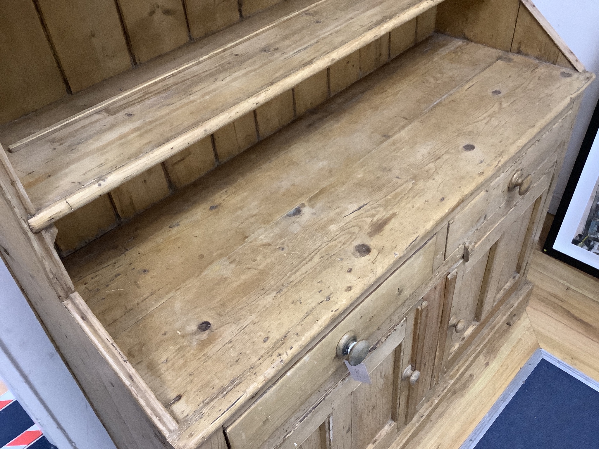 An early 19th century Irish pine dresser, length 122cm, depth 45cm, height 202cm